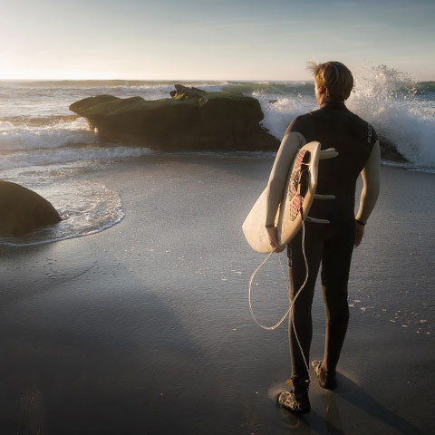 man wears wet suit