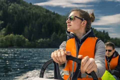 lady wearing a life jacket on boat