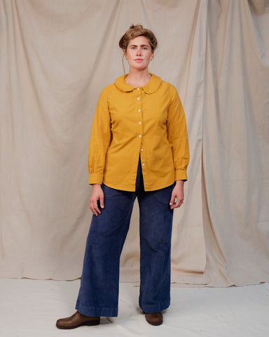 Ruth in goldenrod flannel and deep warm yellow.