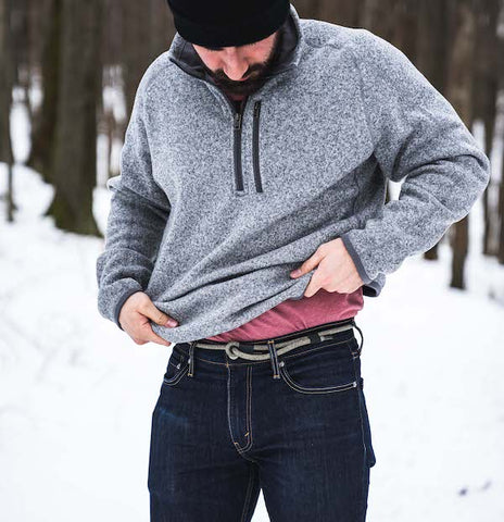 guy out in the snow wearing a rope belt from Lizard Tail Belts