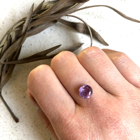 Purple round sapphire cabochon