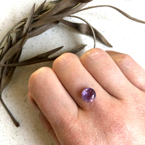 Purple round sapphire cabochon