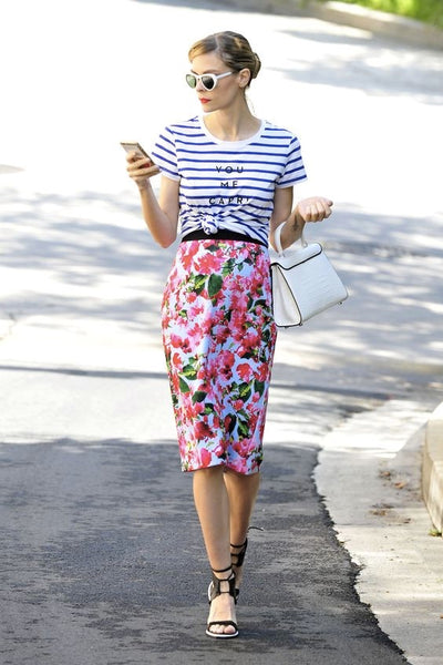 floral print skirt and a striped tee flats