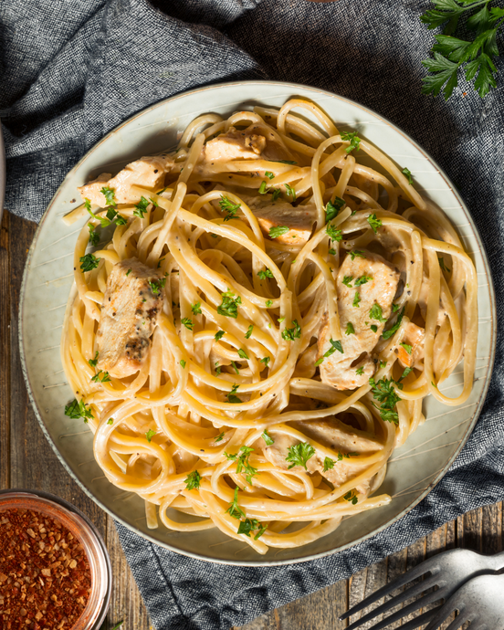 ROASTED GARLIC & SUN-DRIED TOMATO CHICKEN FETTUCCINE ALFREDO