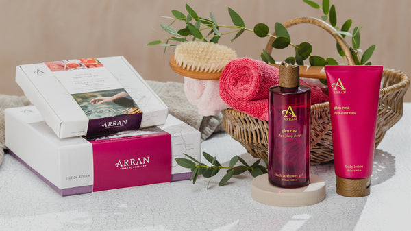 Glen Rosa by ARRAN Sense of Scotland, pictured in pink bottles along with pink gift sets in matching fragrance