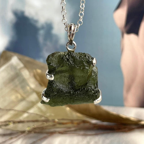 Genuine Faceted Moldavite & Garnet Pendant Online at Talk to Crystals