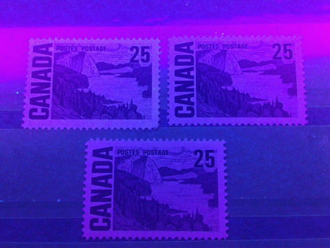 The non-fluorescent papers on Canada #465, the 25c Solemn Land definitive from the 1967-1973 Centennial Issue