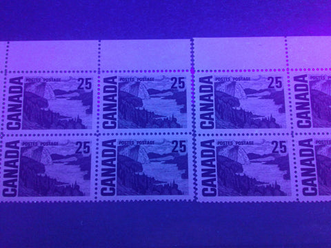 Dull fluorescent greyish white paper under UV, on Canada #465, the 25c Solemn Land definitive stamp from the 1967-1973 Centennial Issue