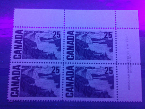 Dull fluorescent ivory paper as seen on Canada #465, 25c Solemn Land definitive of the 1967-1973 Centennial Issue