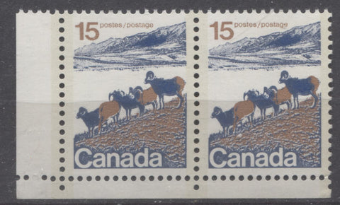 Lower left field stock pair of the 15c Mountain sheep type 2 from the 1972-1978 Caricature issue showing two comb strikes at left