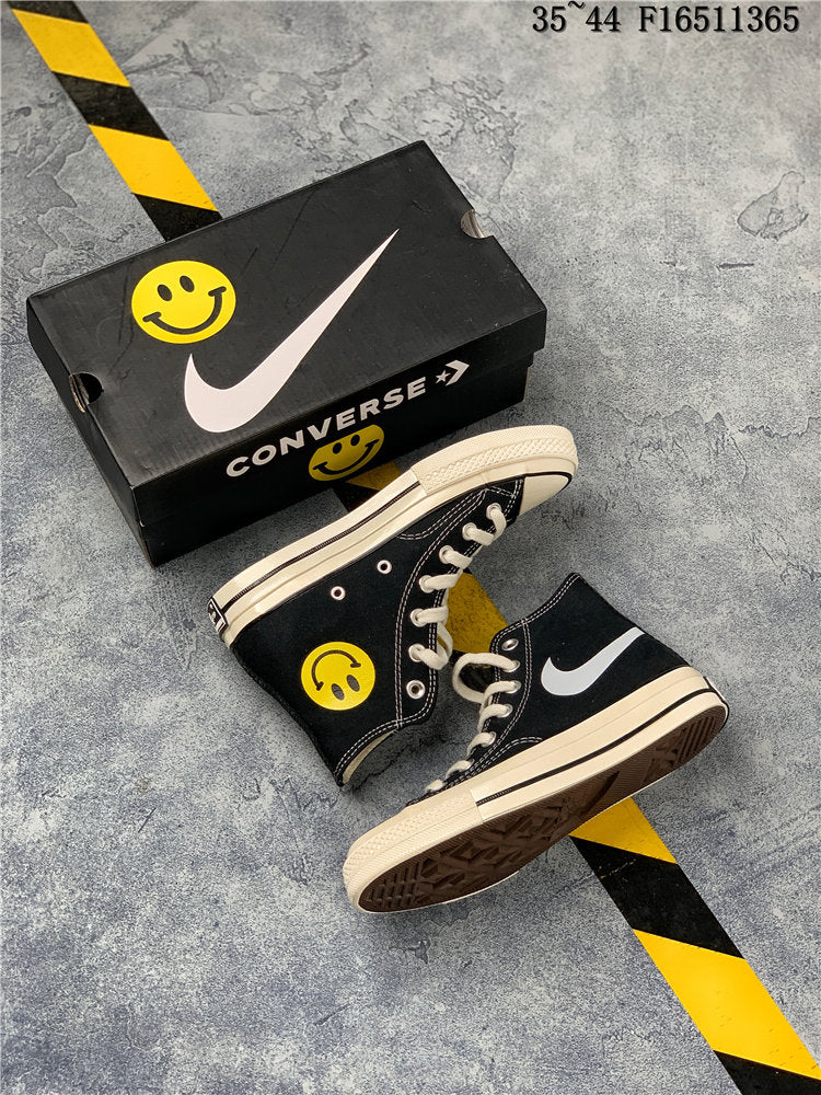 smiley face chuck taylors