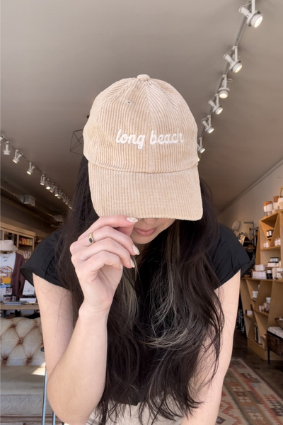 https://cdn.shopify.com/s/files/1/0029/7890/6178/products/LongBeachCorduroyHat-Tan_400x.png?v=1675296915