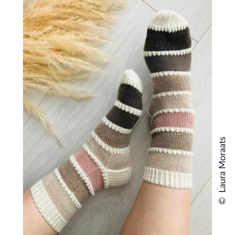 Image of a person wearing the Color Palette Socks by Laura Moraats