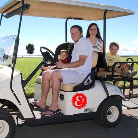 family outing on golf cart