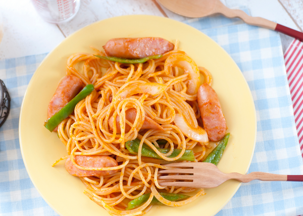 A plate of Japanese spaghetti Naplitan (made with tomato, sausage, bell pepper and onion)
