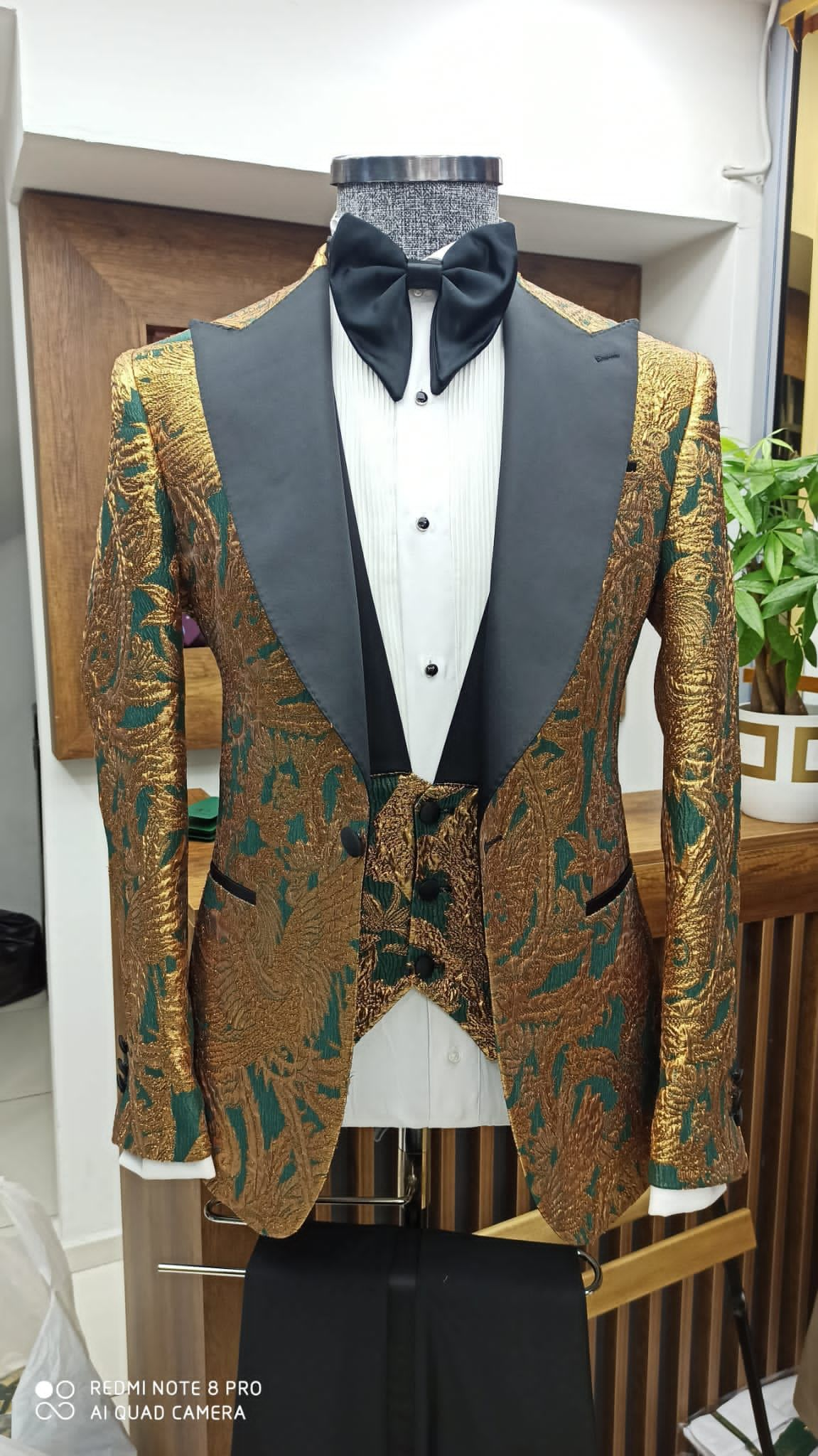 gold and green suit