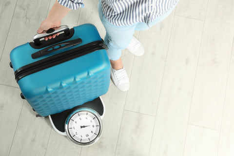 weighing suitcase