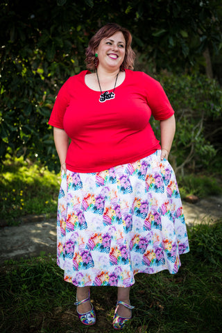 a plus size cotton skirt with a rainbow zebra print on it