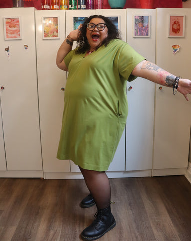 A fat babe in an avocado green dress