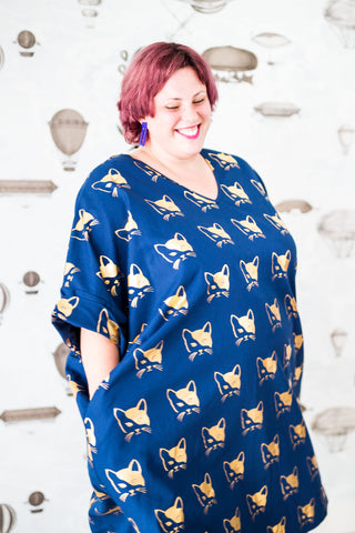 Carma in a cat-print plus size dress