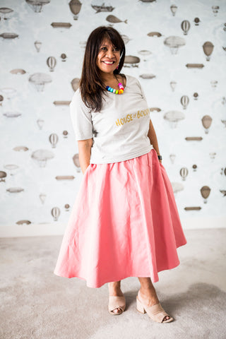 Woman in a blush skirt