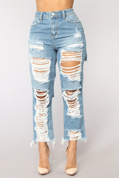 distressed jeans with big holes