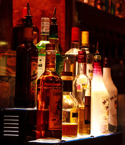 Bar shelf with various liquors