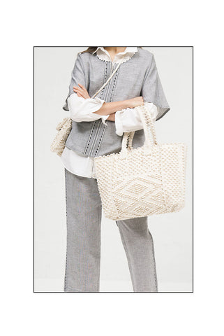 cream tote Sustainable.  Best eco luxury bags and accessories brand. Stylish colothes and Eco-Friendly with recycled yarns #luxury #ecoconcious #sustainablestyle  #ethicalbrands #ecoliving  #ecofashion #ecostyle #ethicalhandbags #handbags #sustainableli