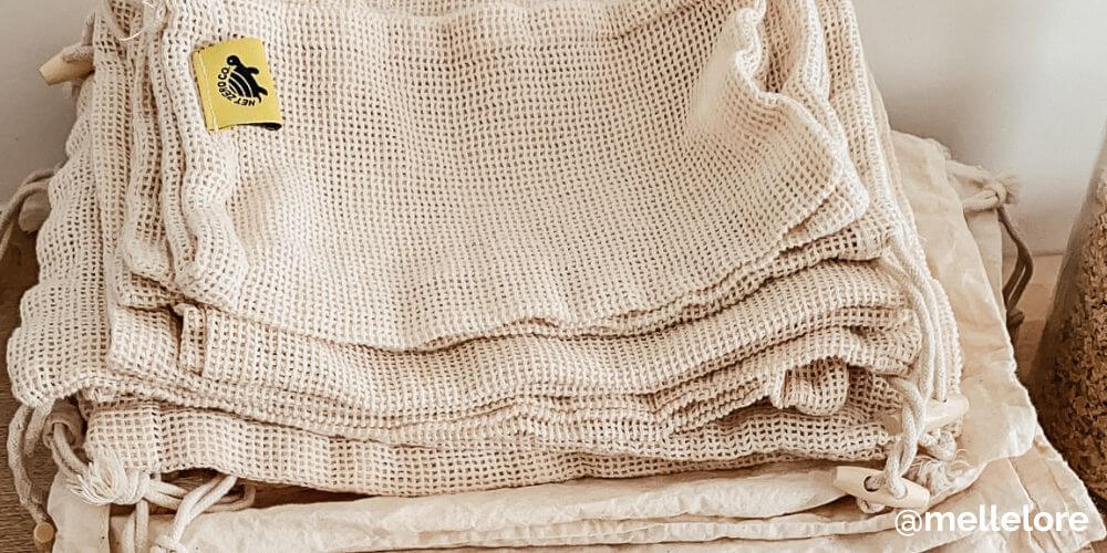 Choose organic materials such as Net Zero Co. reusable organic cotton bags.