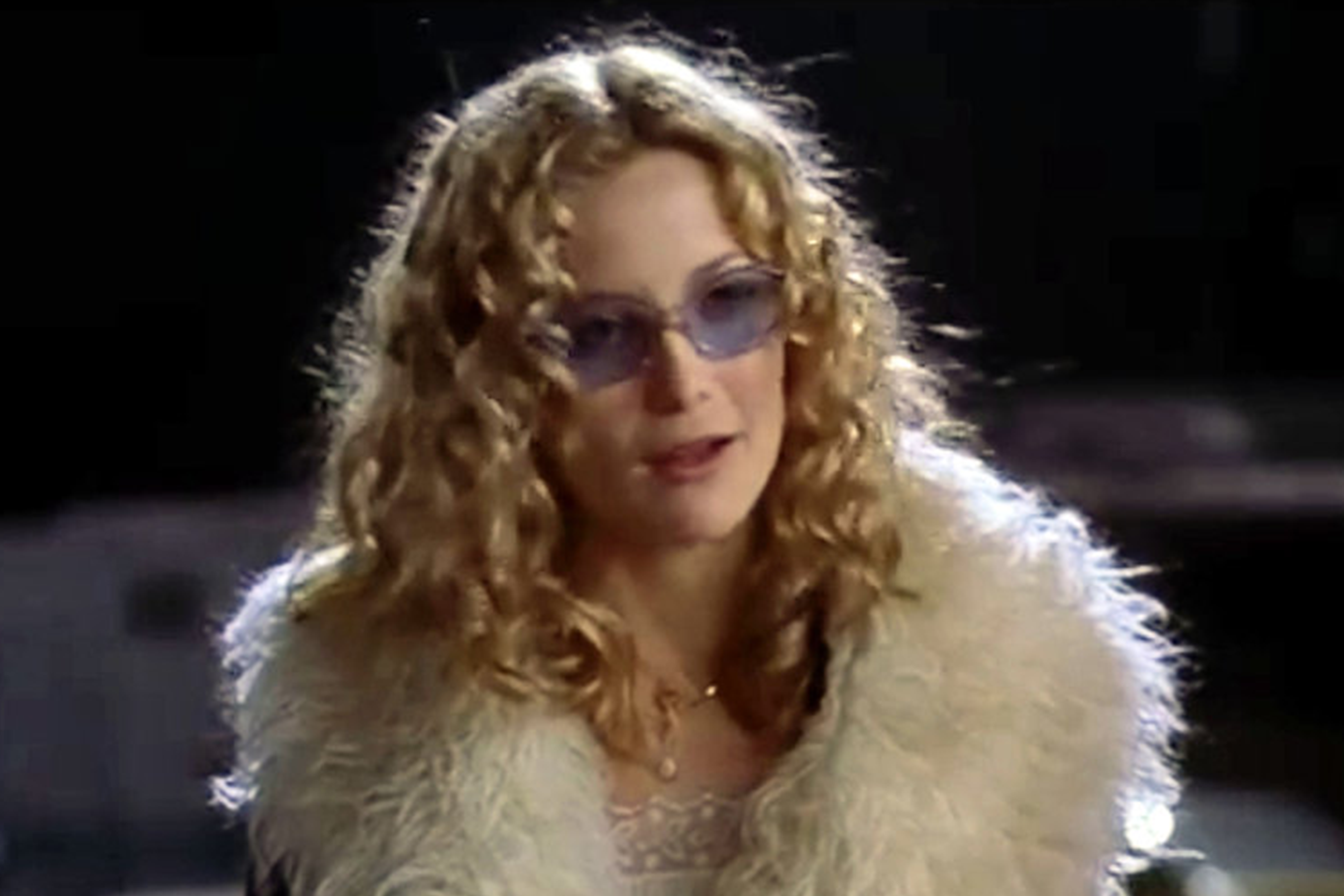 Kate Hudson in Almost Famous wearing small rectangular tinted sunglasses