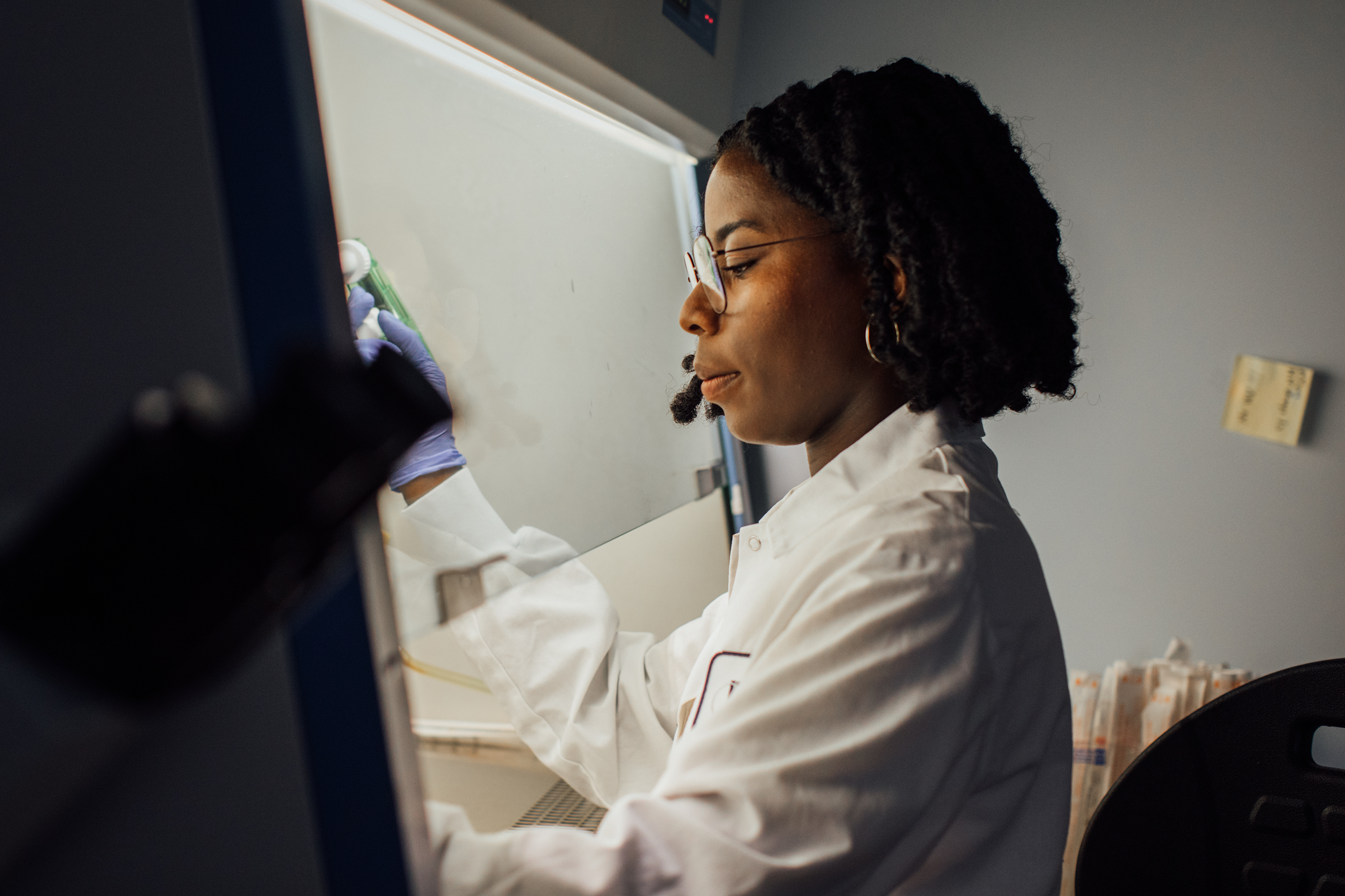 Dr. Yewande working in the lab
