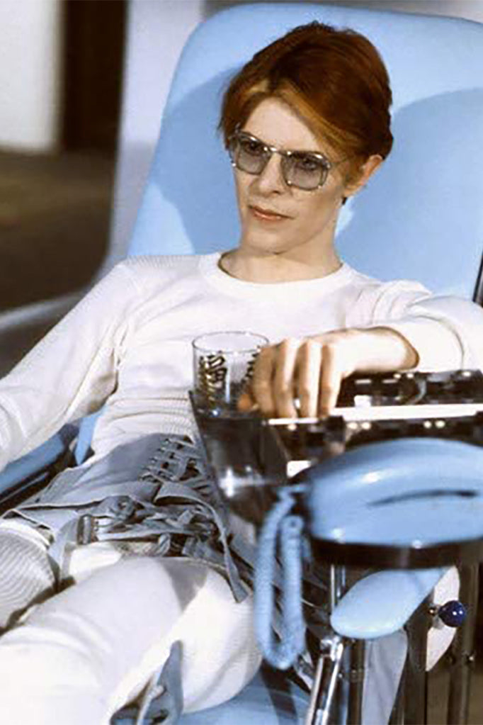 David Bowie wearing eyeglasses in The Man Who Fell to Earth