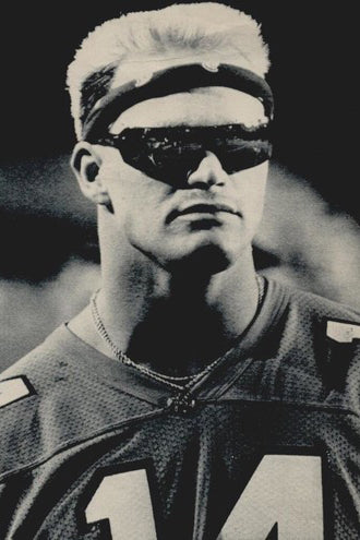 80s NFL fashion, the Boz wearing sunglasses