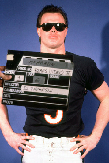 NFL player Jim McMahon wearing sunglasses