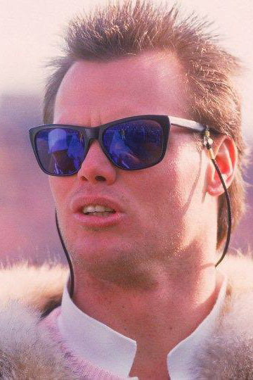 NFL player Jim McMahon wearing sunglasses