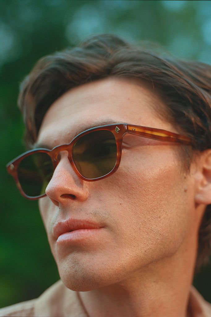 model wearing Garrett Leight California Optical Ace sunglasses