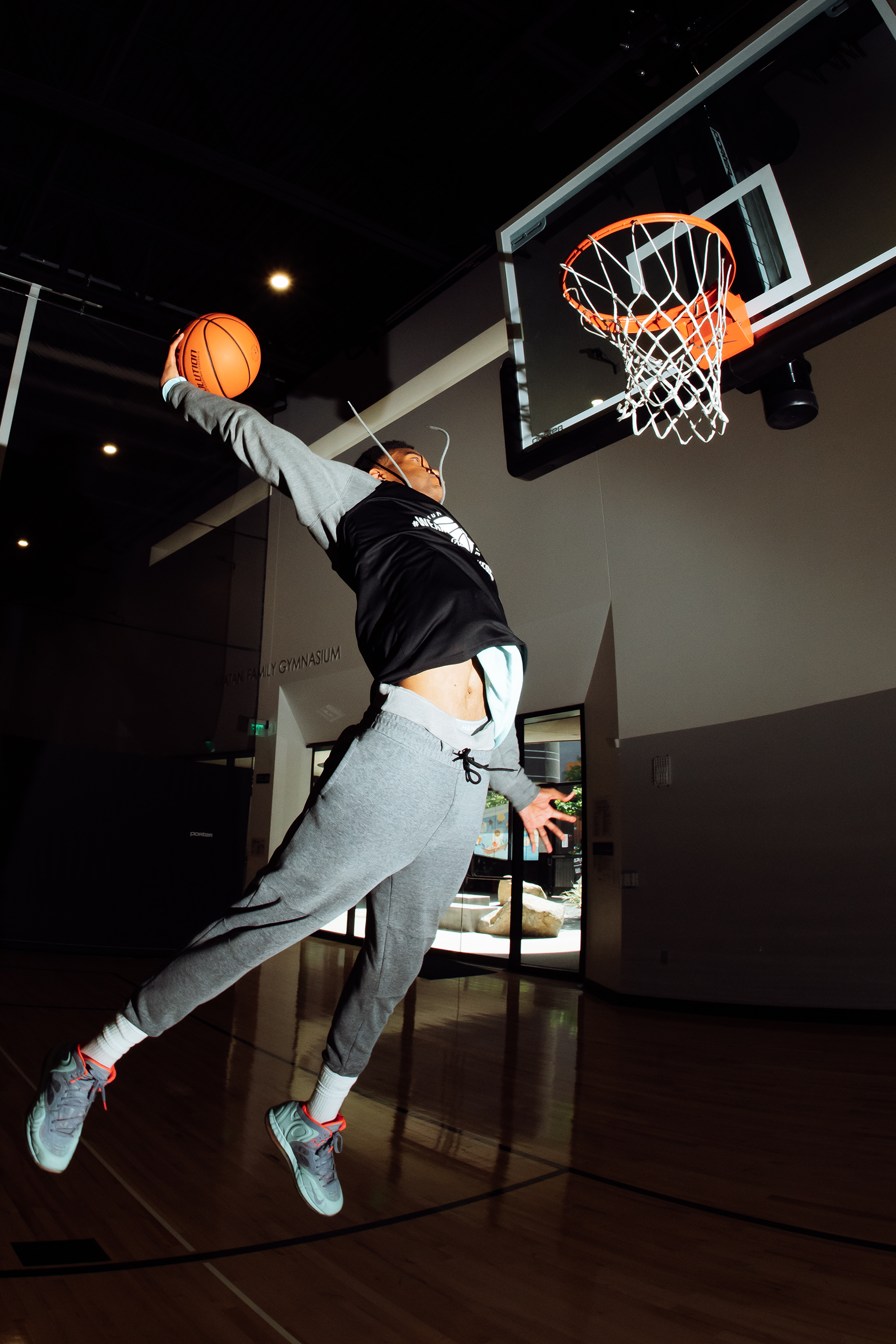 =Basketball player slam dunking
