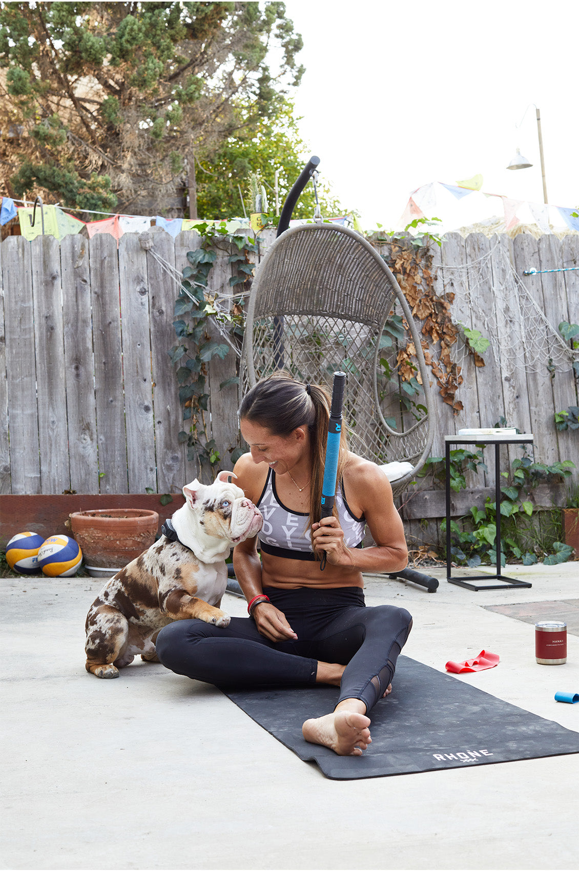 Emily Stockman playing with her dog.