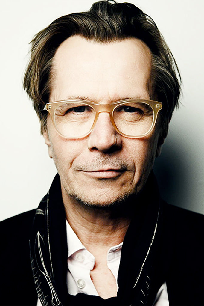 Gary Oldman wearing glasses