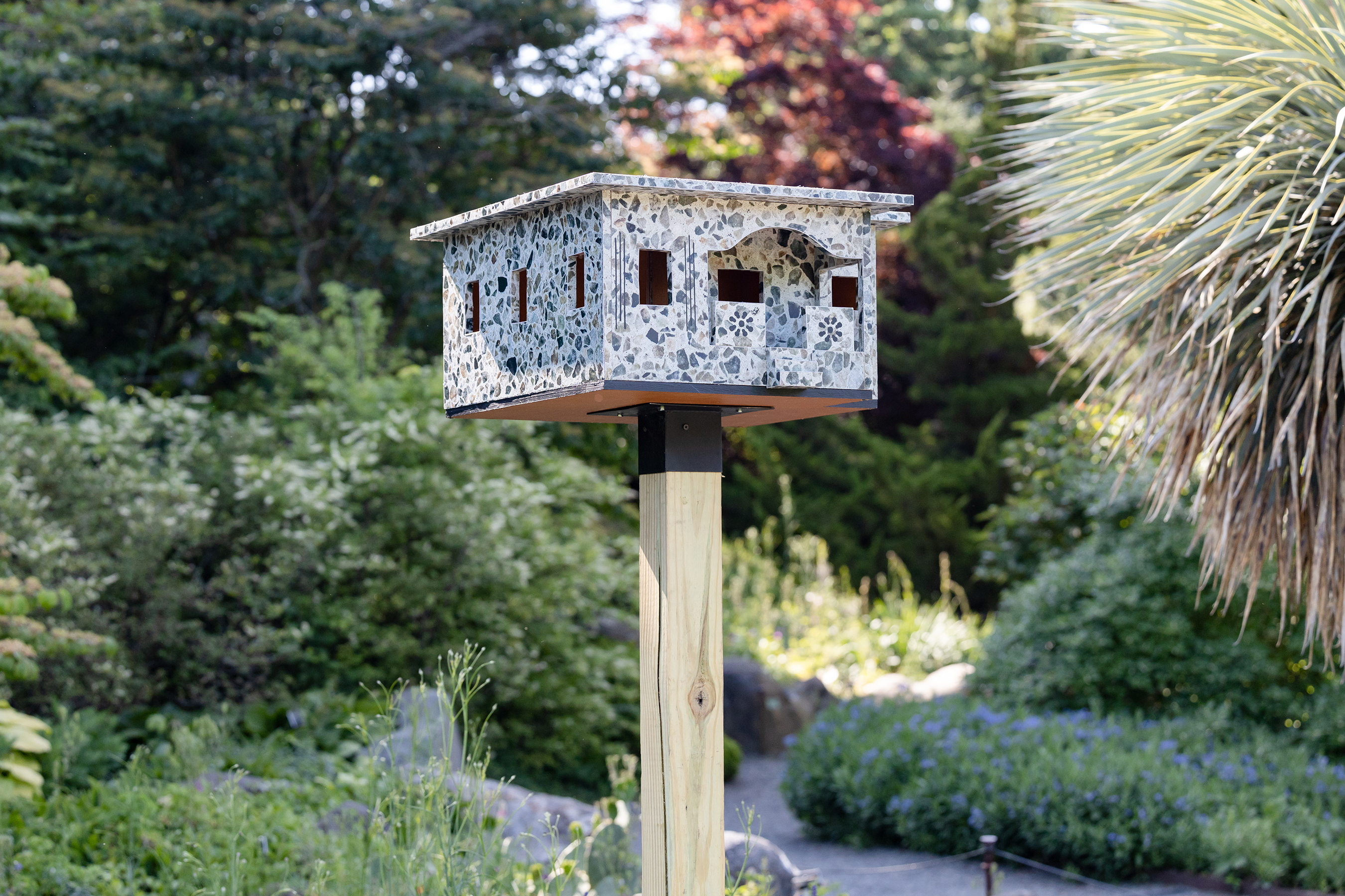 A garden-wide exhibition of site-specific birdhouses called For the Birds