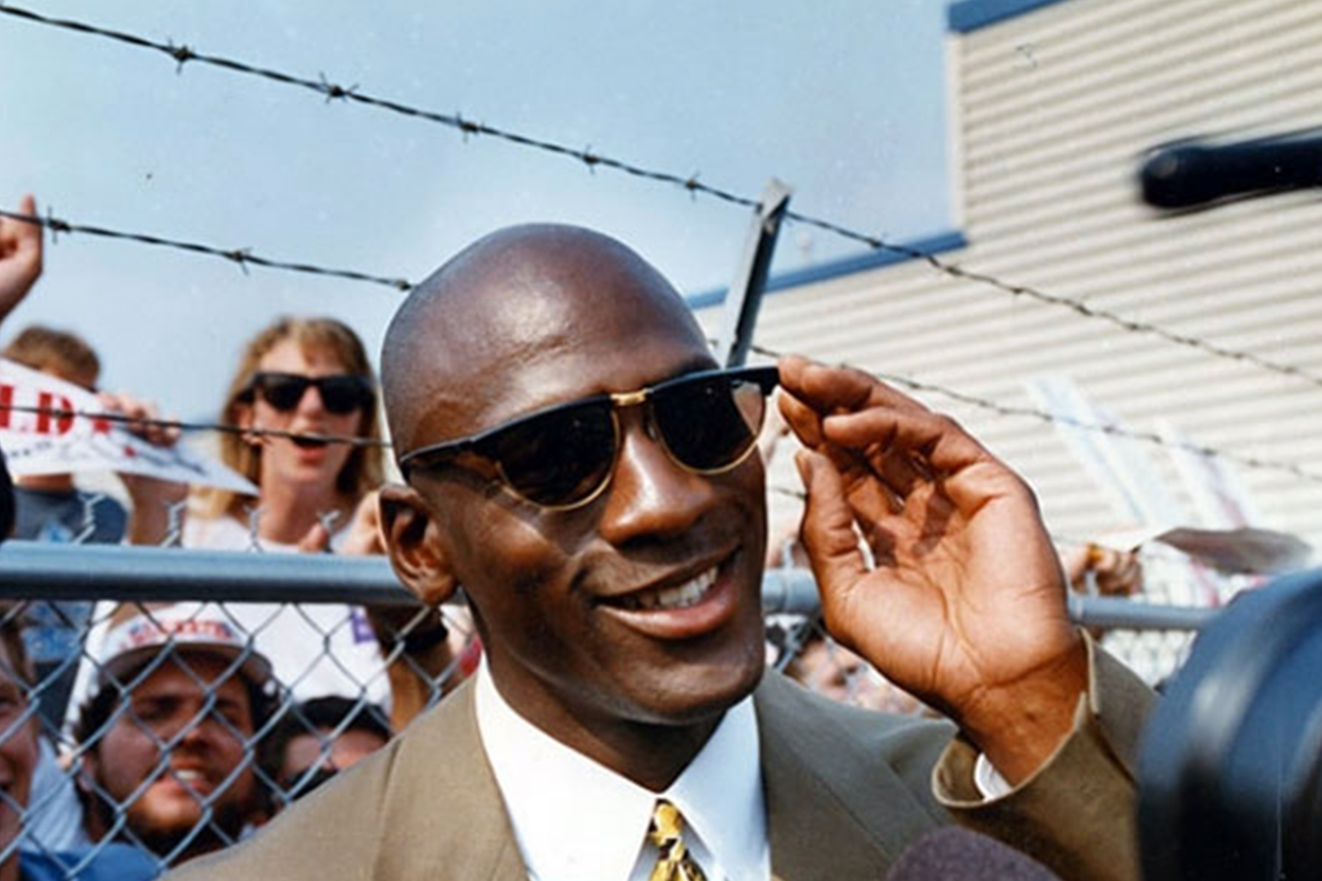Michael Jordan wearing black Wayfarer-style sunglasses