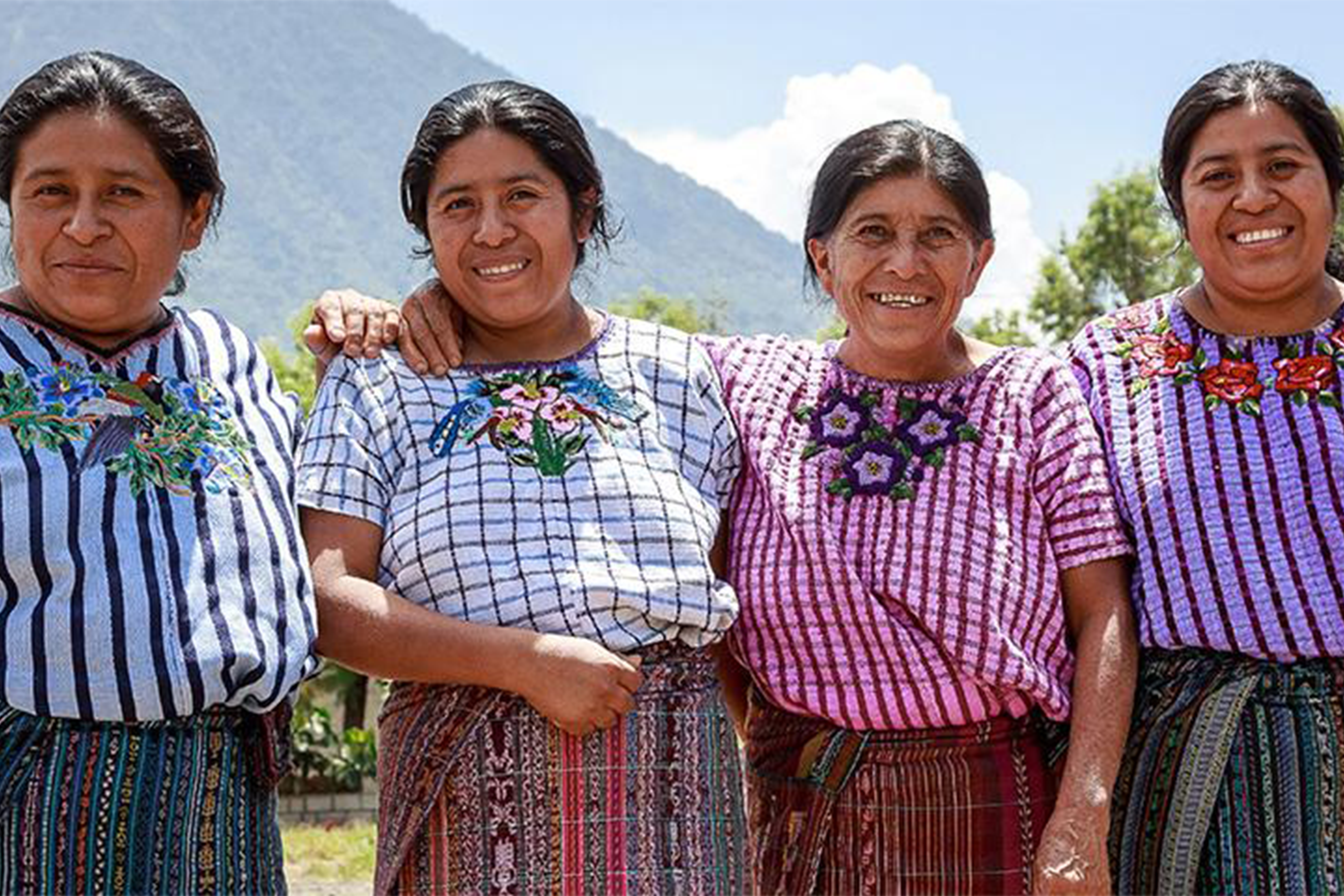 Mayan women standing together and smiling