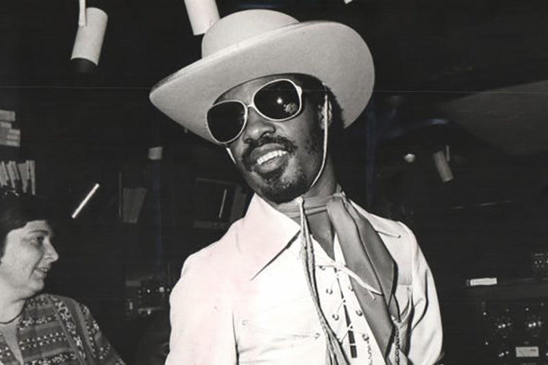 Stevie Wonder wearing sunglasses