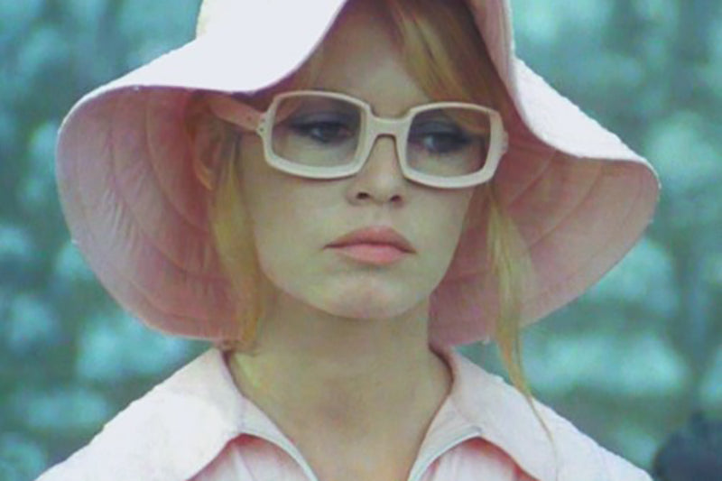Brigitte Bardot wearing rectangular sunglasses in the 60s