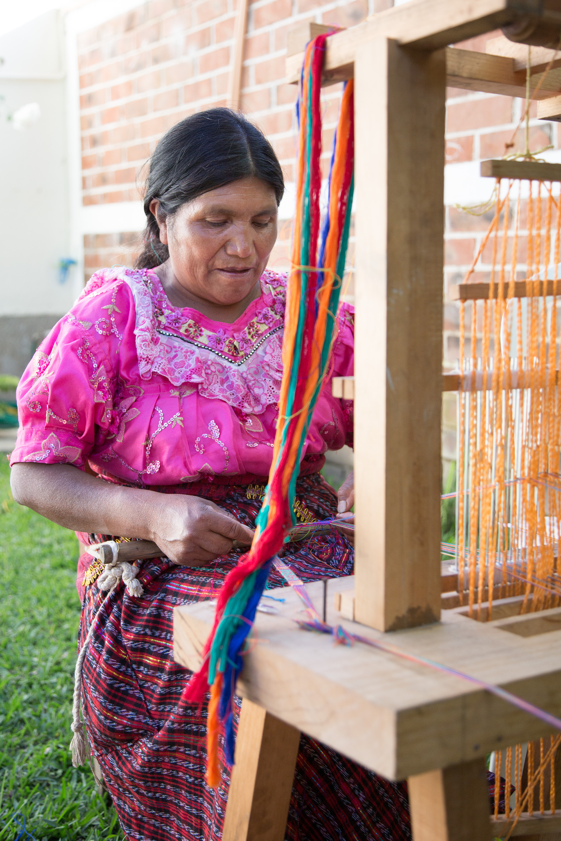 Mayan women weaving on a cinta loom in Panajachel