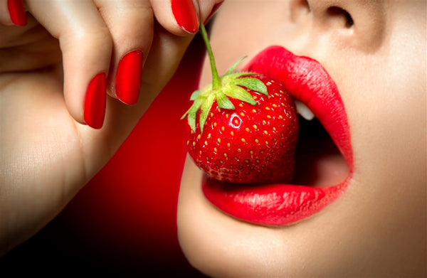 valentines day - eating strawberries seductively