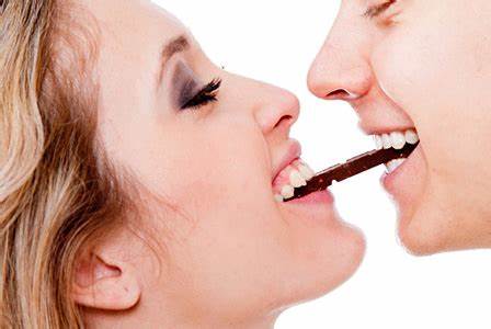 couple eating chocolate - valentines day