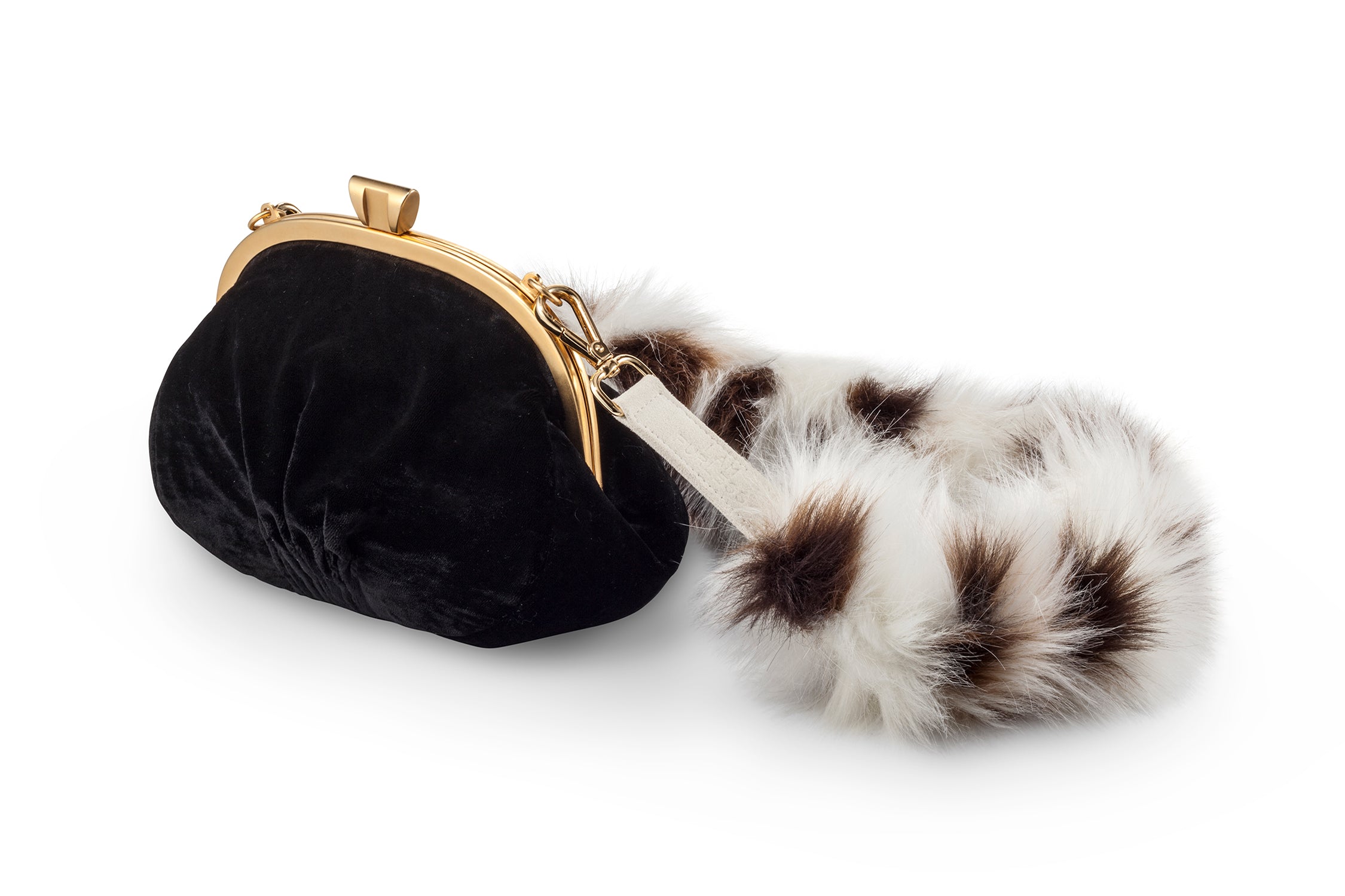 A Packshot Of Marei1998's Forget Me Not Velvet Purse In Black Color. Made From Lustrous Velvet And Topped With Gold Plated Brass Clasp For Smooth Closure. The Puffy Silhouette Is Accentuated By A Lush Faux Fur Strap In Contrasting Spotted Design, Creating A Contemporary Vintage Look. Front View.