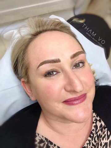 blonde hair lady with her nano brow tattoo