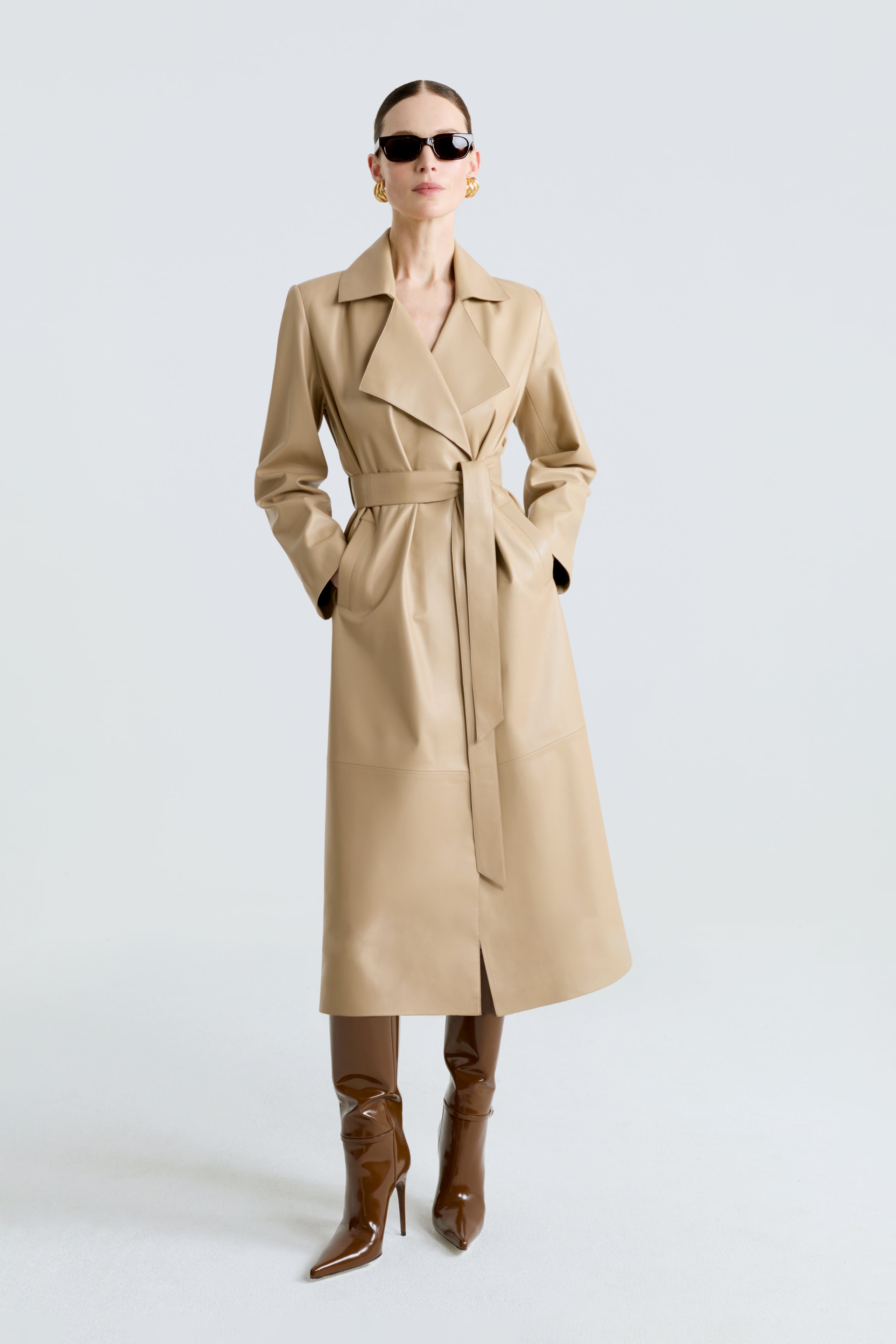 Model is wearing the Amina Beige Belted Leather Coat Front